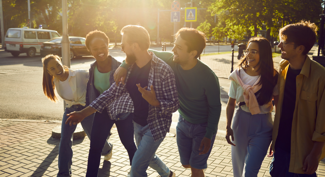 group of young men and women out in the city